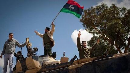 عام على انطلاق الثورة في ليبيا ضد نظام القذافي، الصورة دب ا 