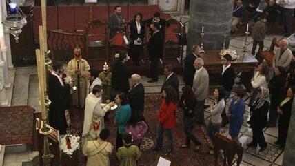 Gottesdienst in der griechisch-katholischen Kirche Al-Niyah in Damaskus; Foto: AFP/Getty Images