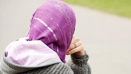 Kopftuch tragende Muslima; Foto: dpa