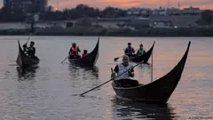 Young Iraqis row a flotilla of traditional wooden boats down the Tigris in Baghdad, celebrating an ancient nautical heritage in the now drought-stricken country. The United Nations ranks Iraq as one of the world's five countries most impacted by climate change.
