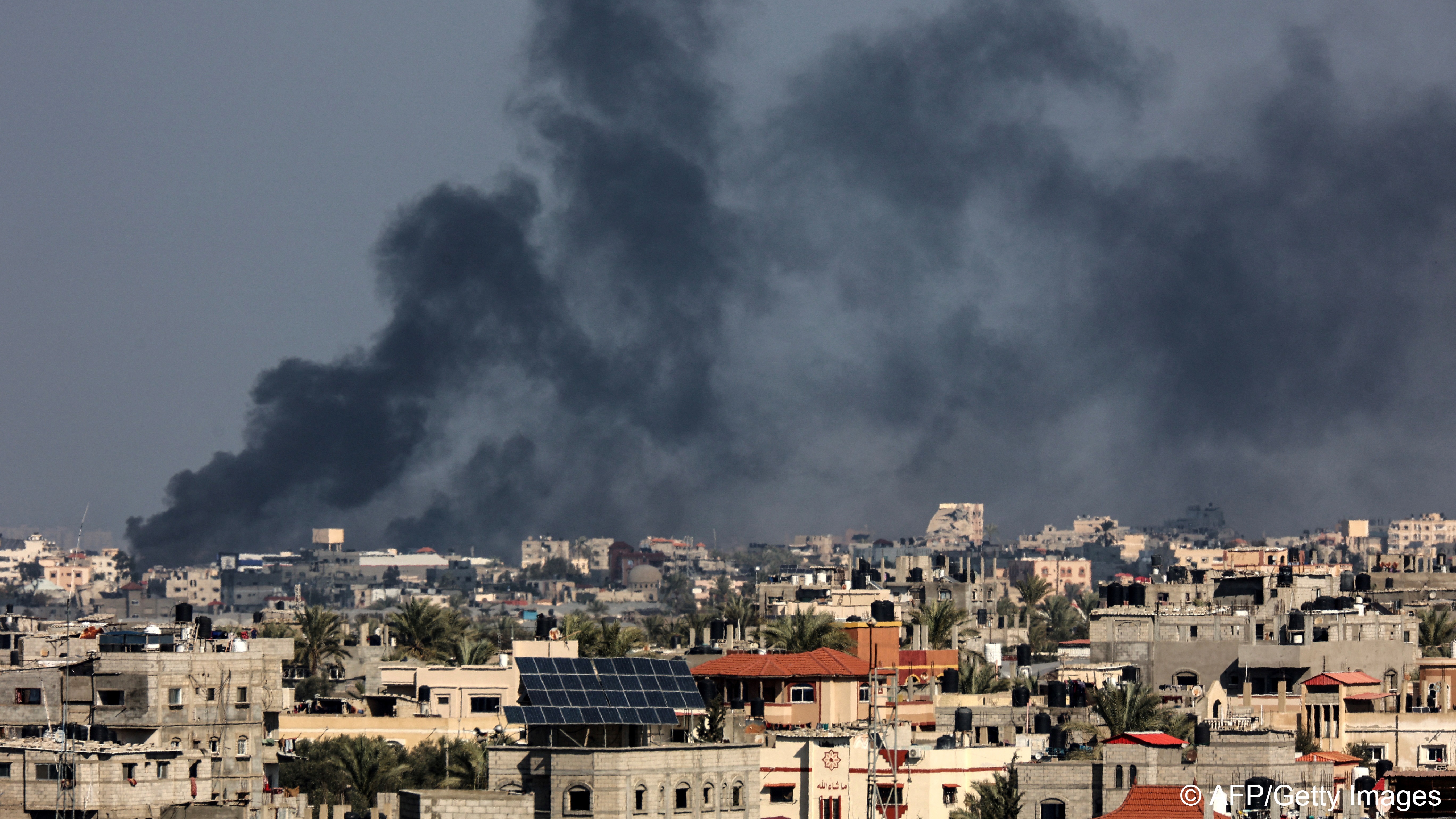 Smoke rises over the southern Gazan town of Khan Younis