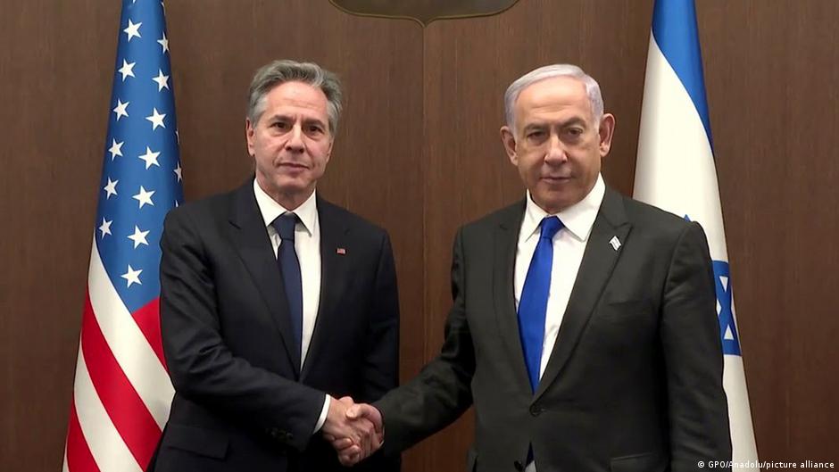 U.S. Secretary of State Antony Blinken, on left, shakes hand with Israeli Prime Minister Benjamin Netanyahu