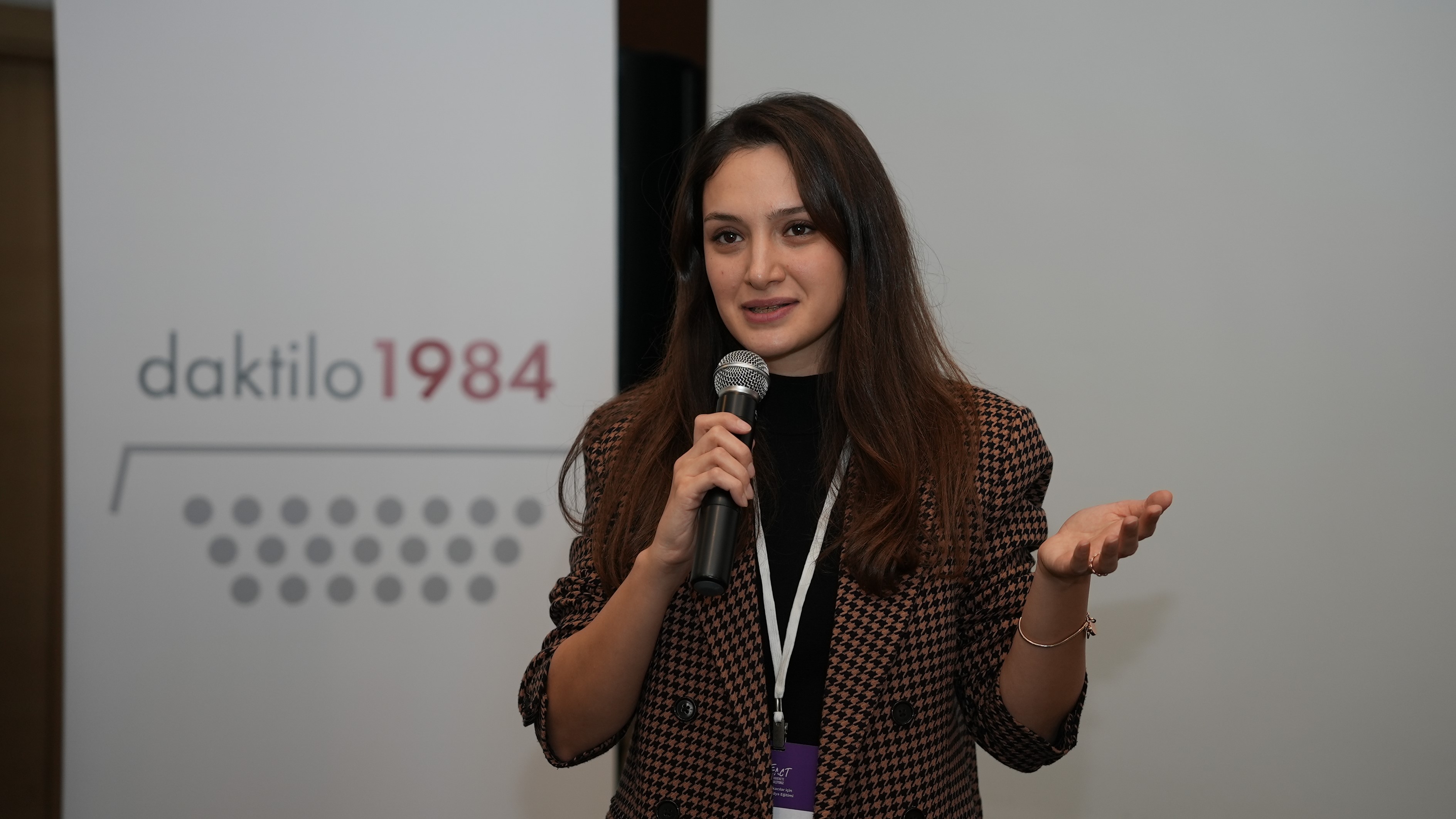 Public speaking coach Elif Menderes addresses participants at a We Act event organised to encourage Turkish women to enter politics