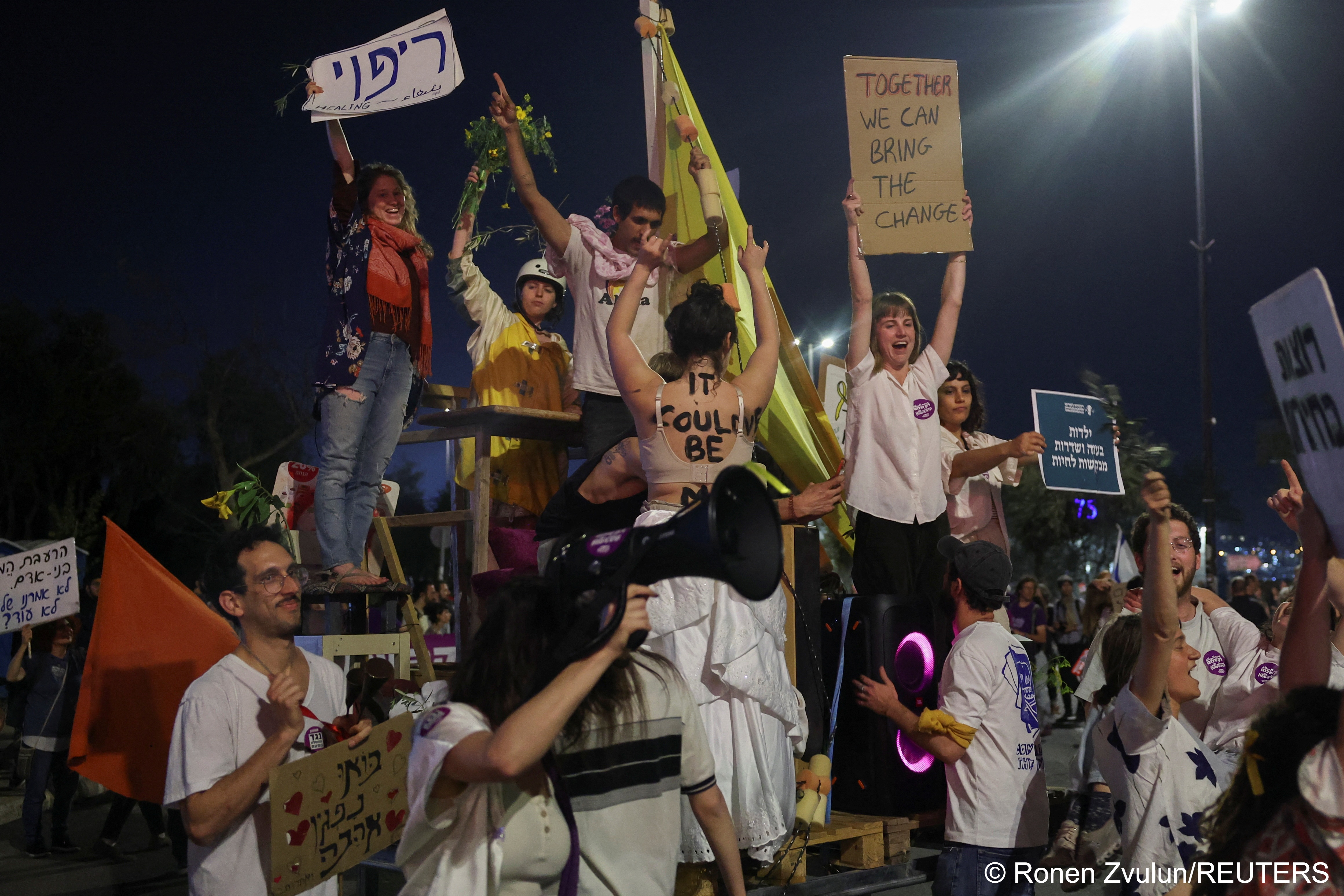 Israeli protesters hold signs and shout slogans during an anti-Netanyahu protest in Jerusalem, Israel, 2 April 2024
