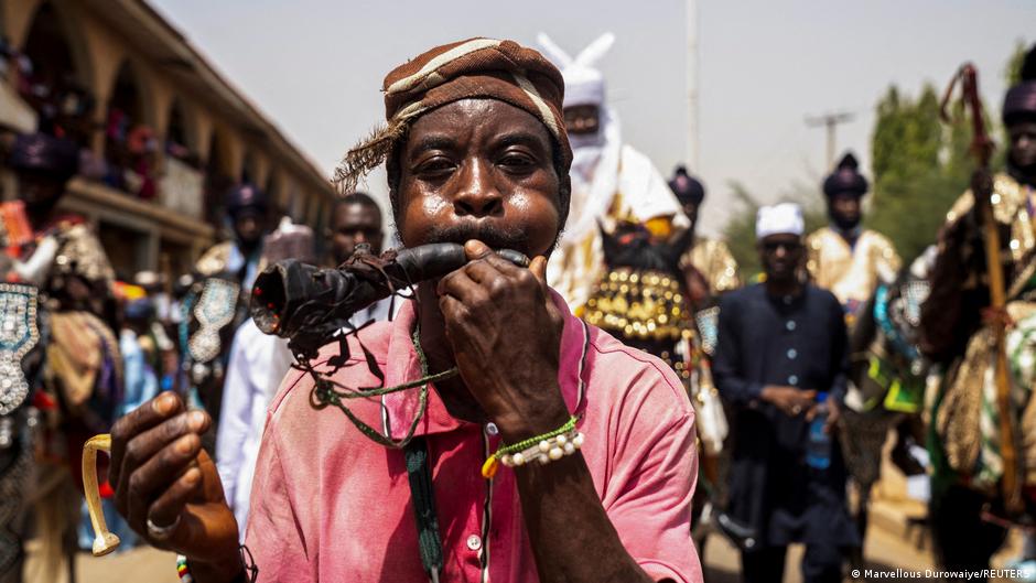 A Muslim faithful celebrates during the Eid al-Fitr festival, marking the end of the fasting month of Ramadan, in Kaduna, Nigeria