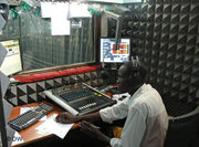 A member of Radio Bakhita staff in the studio (photo: DW)