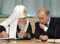 Russian President Vladimir Putin and Russian Orthodox Patriarch Alexy II (photo: AP)