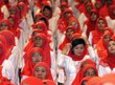 Women in headscarf uniforms in Malaysia (photo: AP)