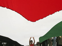 Palestinian boy and Palestinian flag during a rally in Gaza (photo: AP)