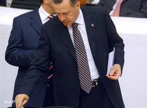 Prime minister Erdogan taking part in a vote (photo: AP)