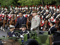 Nicolas Sarkozy during a military parade in Paris (photo: AP)