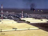 Rectangular slabs of hardened sulfur proliferate at Tengiz, the biggest oil field in Kazakhstan, June 2001 (photo: AP) 