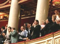 Armenians applaud after debates on the Armenian genocide at the National Assembly in Paris (photo: AP) 