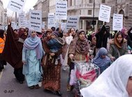 Muslims march through central London during an angry but peaceful protest against the publication of Prophet Muhammad cartoons (photo: AP)