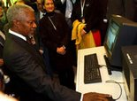 Logging on -- U.N. Secretary General Kofi Annan in Geneva ahead of the World Summit on the Information Society. (photo: AP)