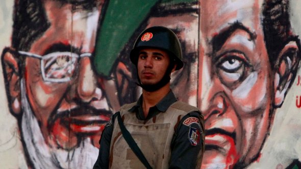 Graffiti Mubaraks und Mursis in Kairo; Foto: Reuters 