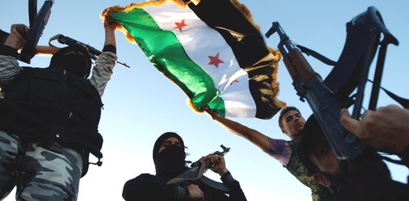 FSA-Kämpfer in einem Vorort von Idlib; Foto: AP