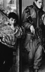 Israeli soldier and Palestinian boy (photo &amp;copy Judah Passow)