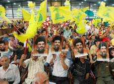 Hisbollah-Anhänger in einem südlichen Vorort von Beirut, Foto: AP