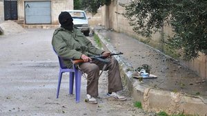 Ein bewaffneter Rebell in Homs. Foto:AP/dapd