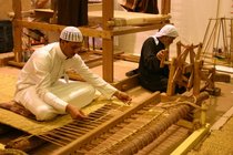 Carpet weavers at work at the Janadriyah festival (photo: Hanna Labonté)