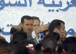Syrischer Präsident Baschar al-Assad auf der IT-Messe in Damaskus, Foto: AP