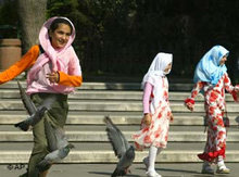Turkish girls playing in a park (photo: AP)