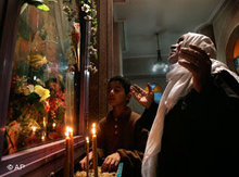 Copts praying in Egypt (photo: AP)