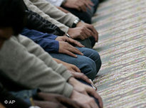 Bosnian Muslims perform their traditional Friday prayers in a mosque (photo: AP)