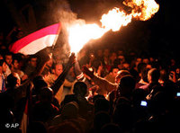 المصريون يحتفلون بفوزهم في القاهرة، الصورة أ ب