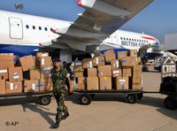 A British Airways plane brings boxes of humanitarian aid and supplies to the Rafik Hariri International Airport, Beirut (photo: AP)