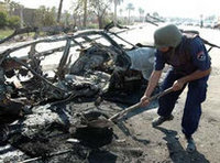 آثار عملية انتحارية في بغداد، الصورة: أ ب