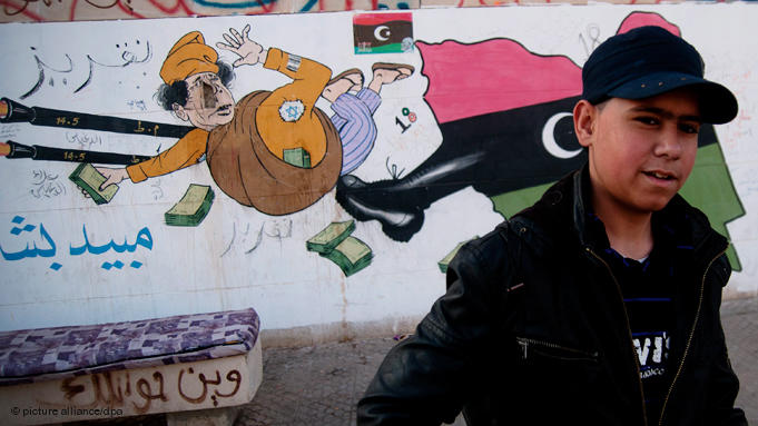Kick in the backside for Qaddafi