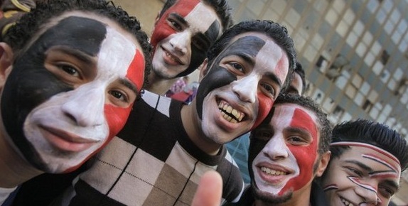 Egyptian youngsters on the streets of Cairo: As well as anger and annoyance, the young anti-Mubarak demonstrators also share some happy moments