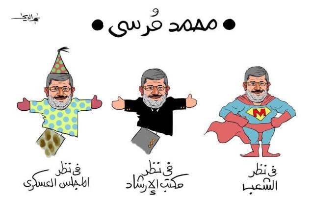 14. Präsident Mursi als Kasperle
