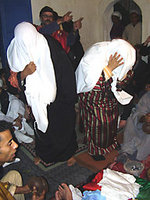 Women during a Gnawa ritual (photo: Andreas Kirchgäßner)