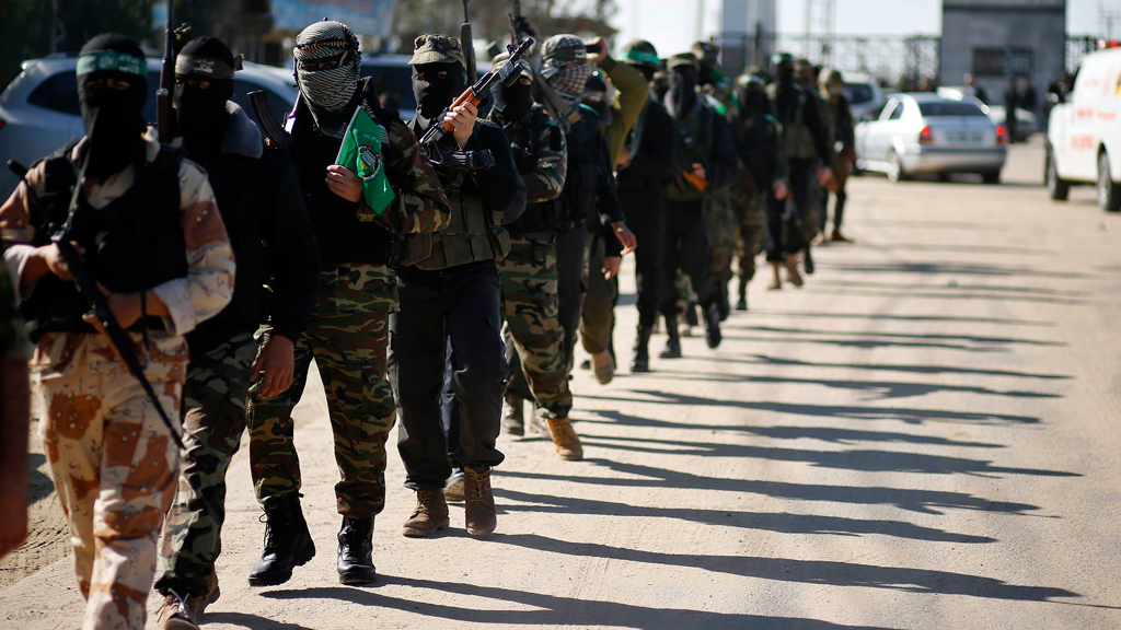 Members of the al-Qassam Brigade at the arrival of their political leader Khaled Mashaal (Photo: Reuters)