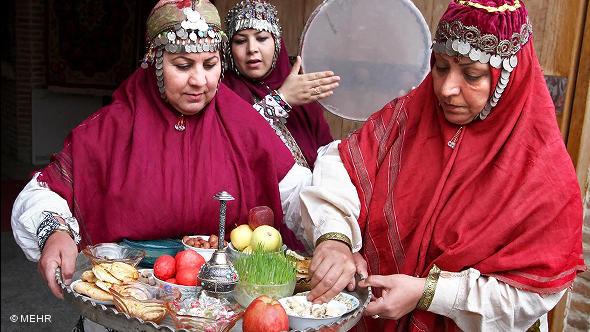Two women preparing the new year's platter (photo: © Mehr)