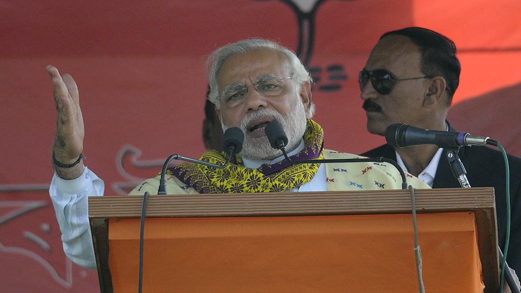 BJP Prime Ministerial candidate Narendra Modi delivering his speech at Gogamukh in the Dhemaji district in Assam on 31 March 2014 (photo: UNI)