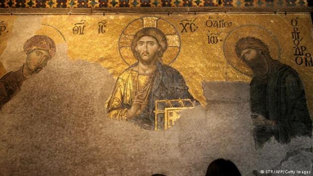 Partially restored 14th century mosaic from Hagia Sophia depicting Jesus, Mary and John. Photo © STR/AFP/Getty Images