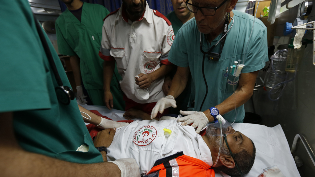 Man receiving treatment at al-Shifa Hospital, in Gaza City, 18 July 2014 (photo: MOHAMMED ABED/AFP/Getty Images)