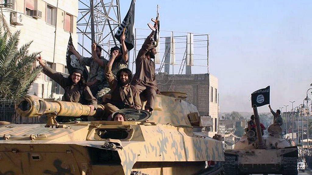 Vorrückende ISIS-Kämpfer im syrischen Raqqa am 30.06.2014; Foto: picture alliance/AP