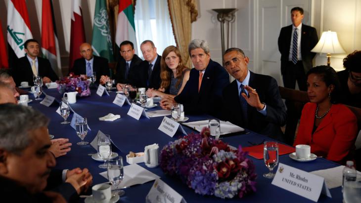 An American delegation headed by President Obama in talks with an Iraqi delegation (photo: Reuters/Brandon Lamarque)