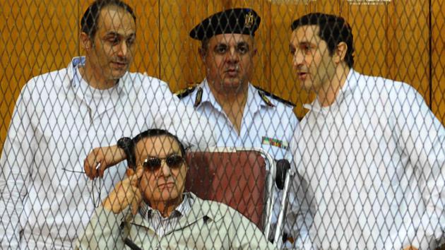 Hosni Mubarak and his sons in court (photo: Ahmed El-Malky/AFP/Getty Images)