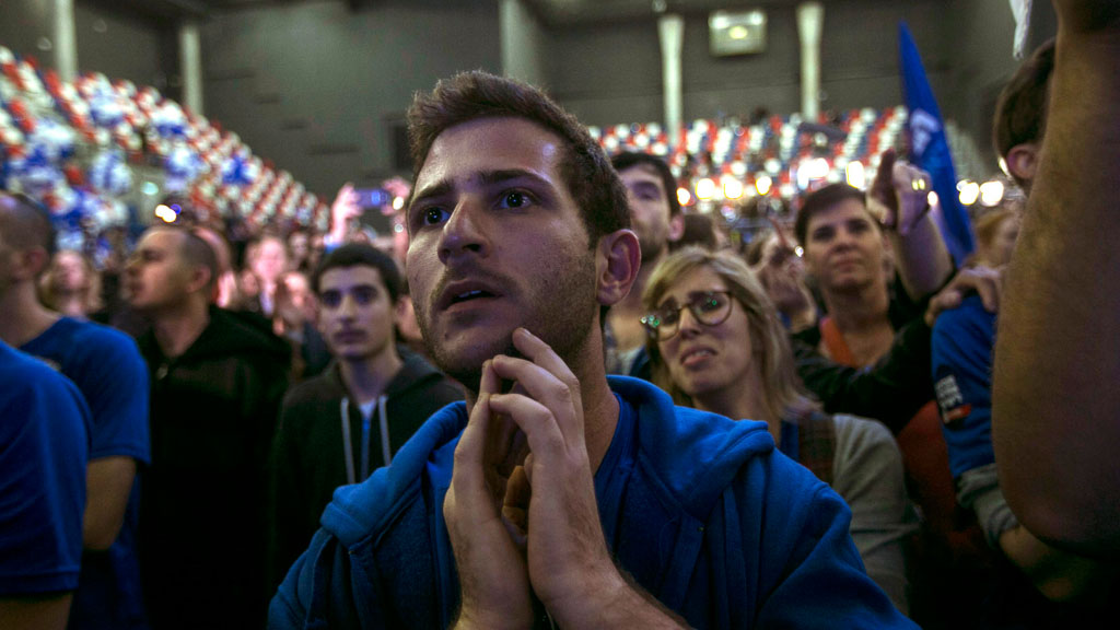 A Zionist Union party supporter reacts to exit poll results, Tel Aviv, 17 March 2015 (photo: Reuters/B. Ratner)