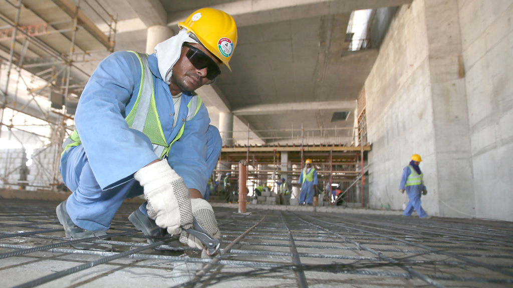 Gastarbeiter an einer Baustelle in Doha. Foto: Karim Jaafar/ AFP/ Getty Images