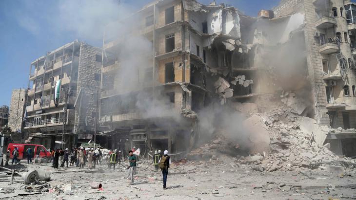 The aftermath of a barrel bomb attack in Aleppo