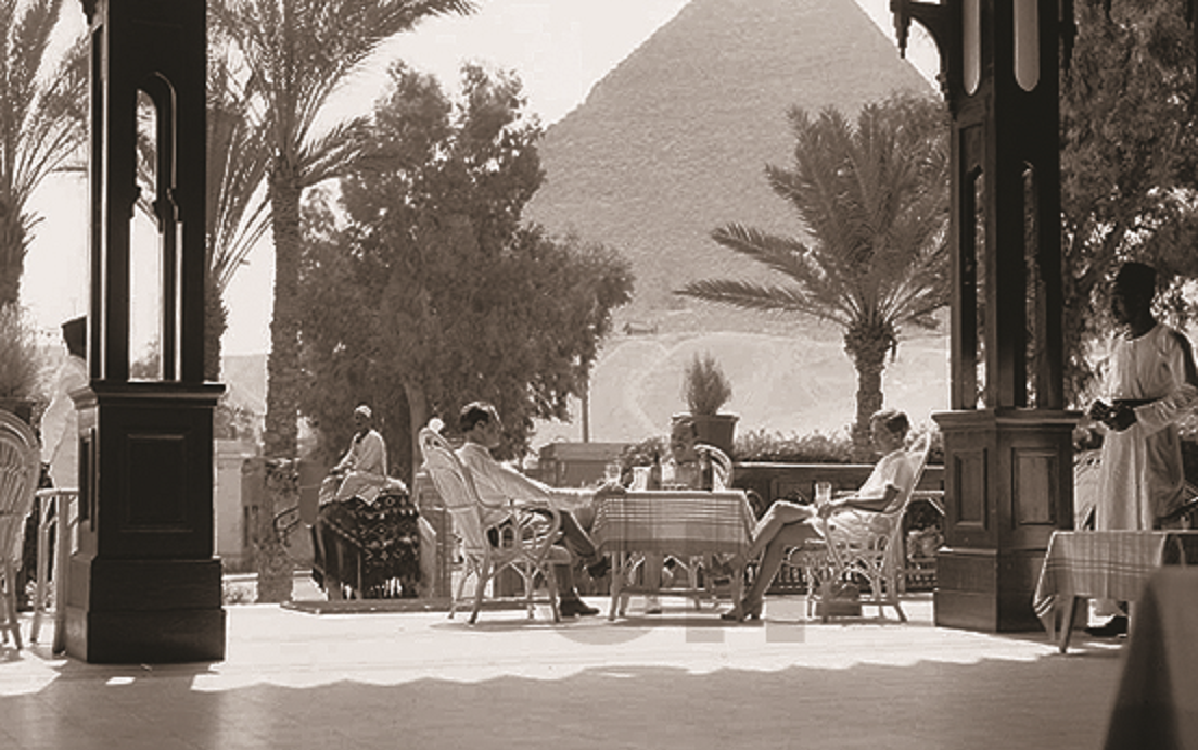 On the terrace at Mena House, ignoring the pyramids (source: grandhotelsofegypt.com)