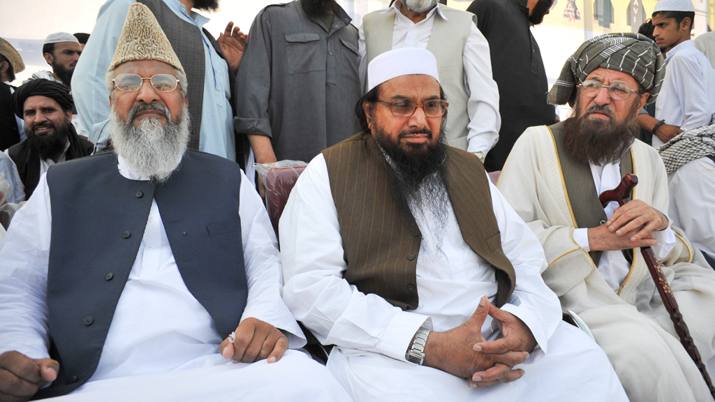 Sipah leader Muhammad Ahmed Ludhianvi (left) attending a rally against the reopening of NATO supplies to Afghanistan in Peshawar, 15 April 2012 (photo: Getty Images/AFP/A.Majeed)