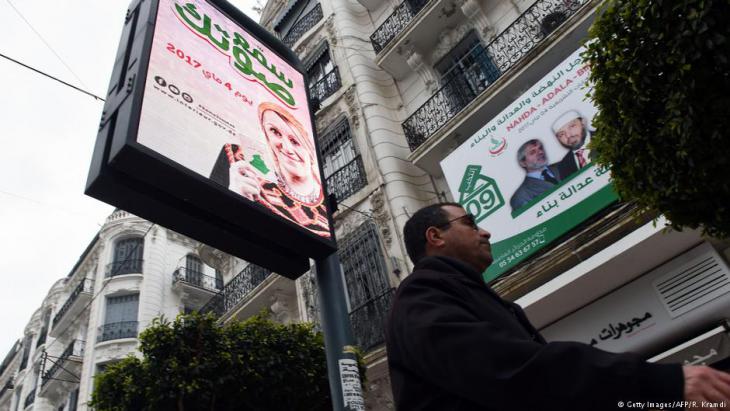 Election posters in Algiers encouraging people to vote in the upcoming parliamentary elections (photo: Getty Images/AFP)